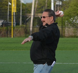 Sachem AD Pete Blieberg throws out the first pitch.